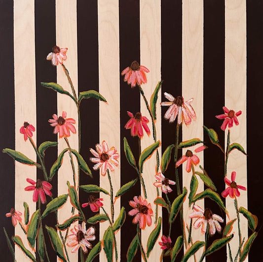 Floral pattern with pink flowers and green leaves on a black and white striped background