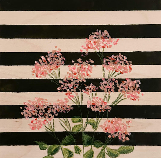 pink oil pastel florals on a very dark green and wood striped wood panel.