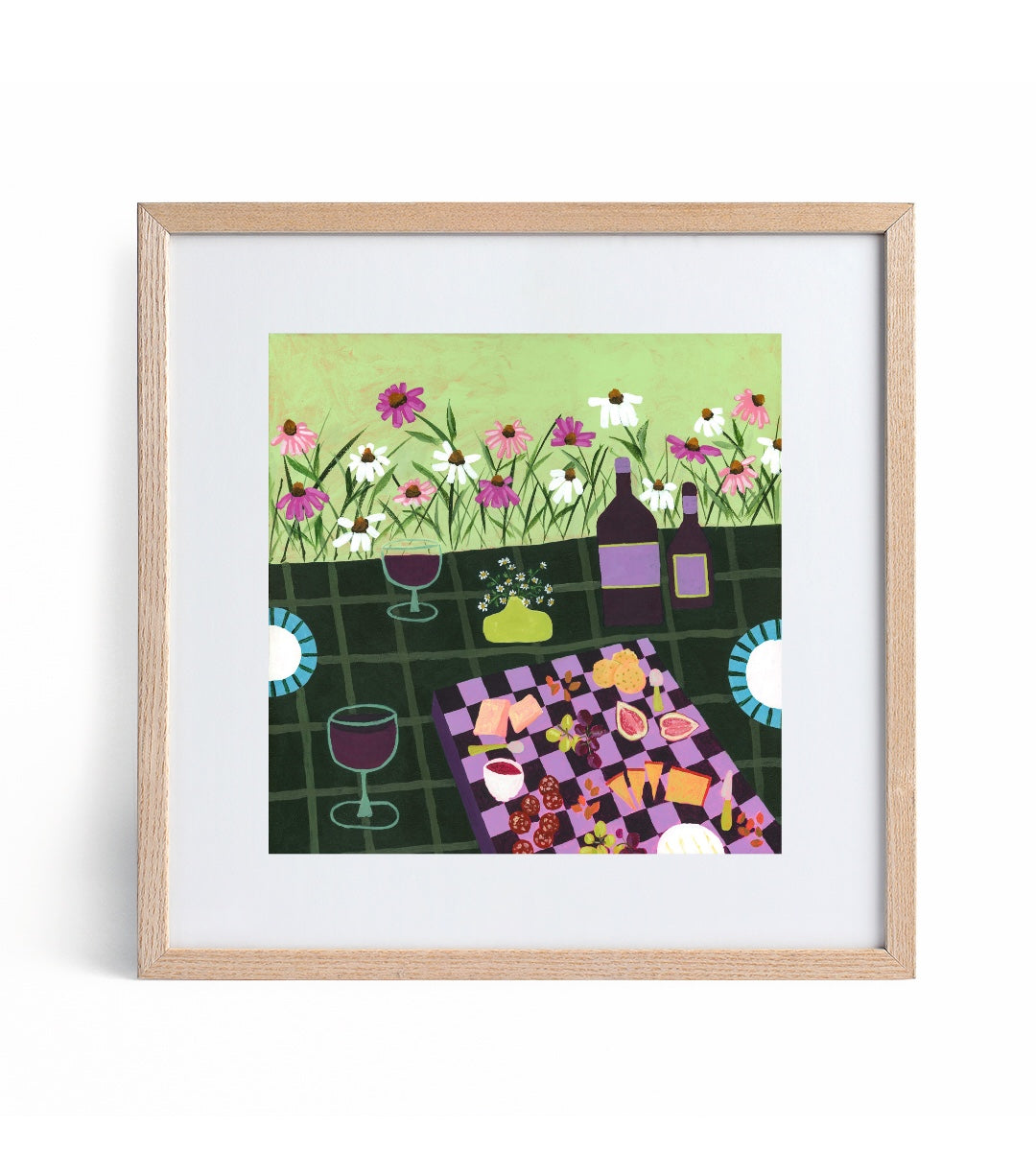 Framed artwork of a garden party scene with flowers, bottles, and tableware.