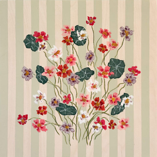 Floral design with red, pink, and white flowers on a striped background