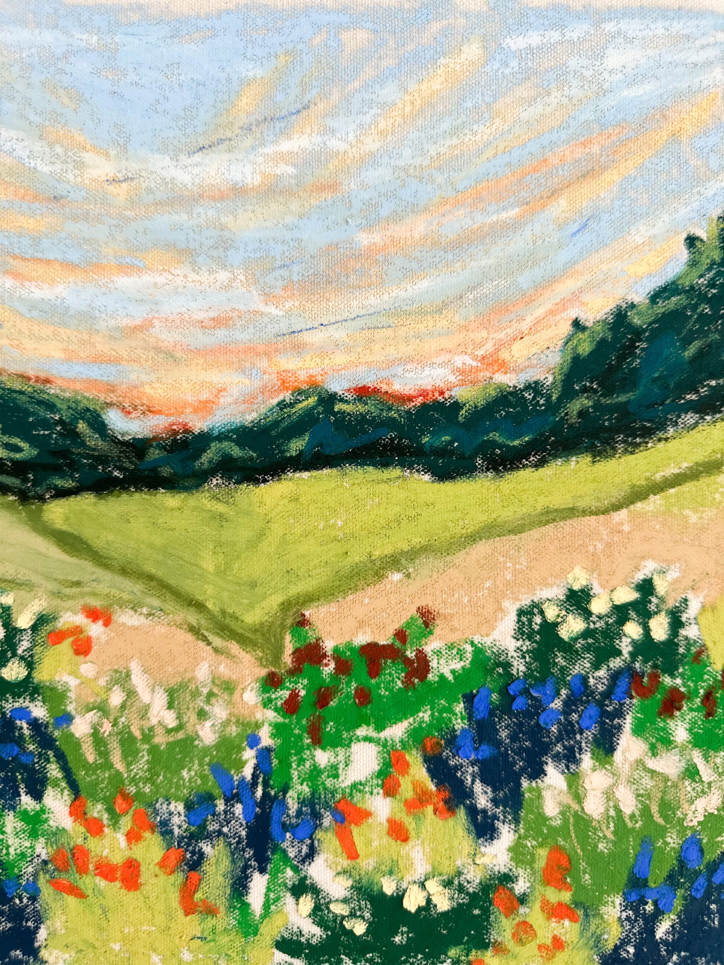 Painting of a landscape with green fields, trees, and a colorful sky.