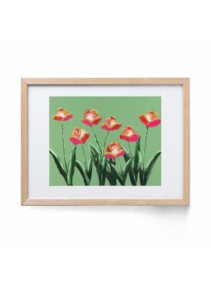 Pink tulips on a green background