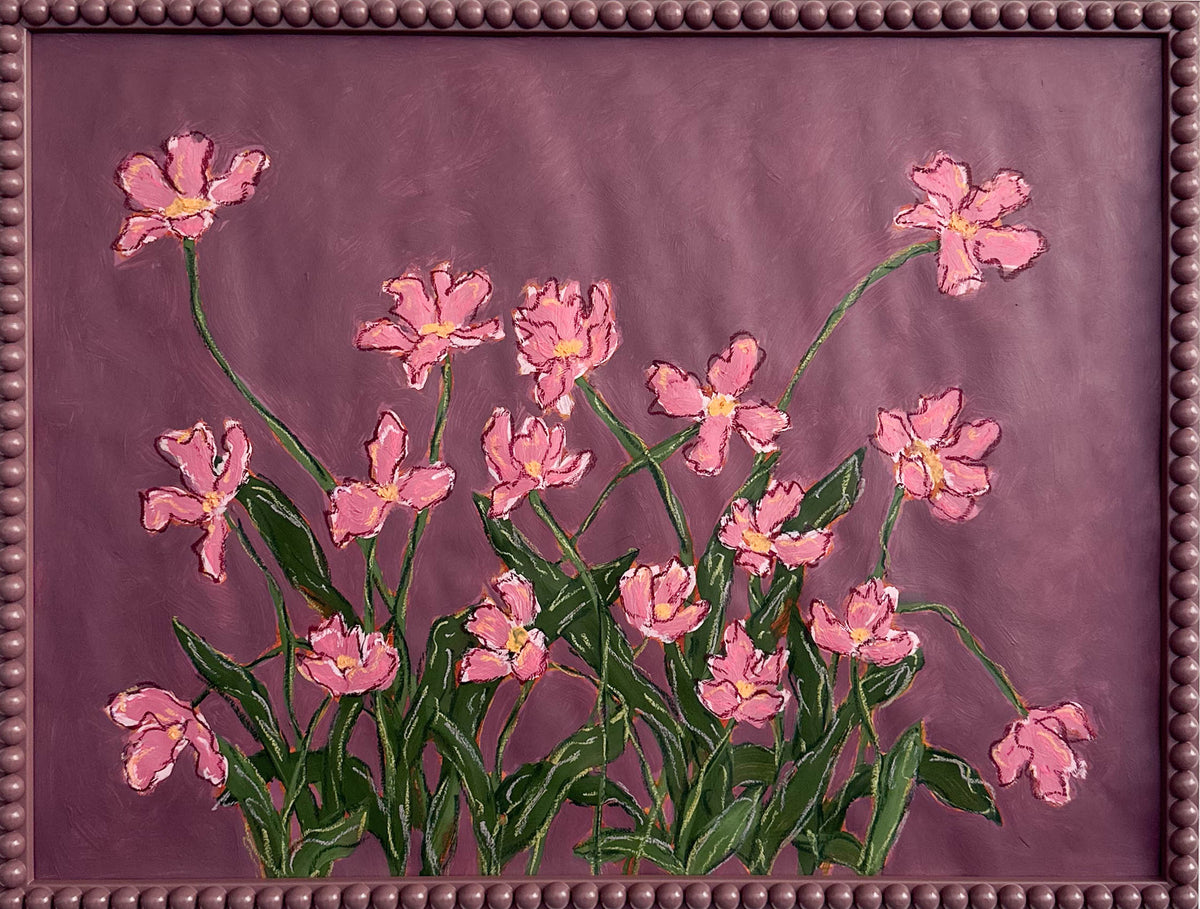 A painting o pink flowers with green leaves on a  plum background framed in a plum bobbin frame.