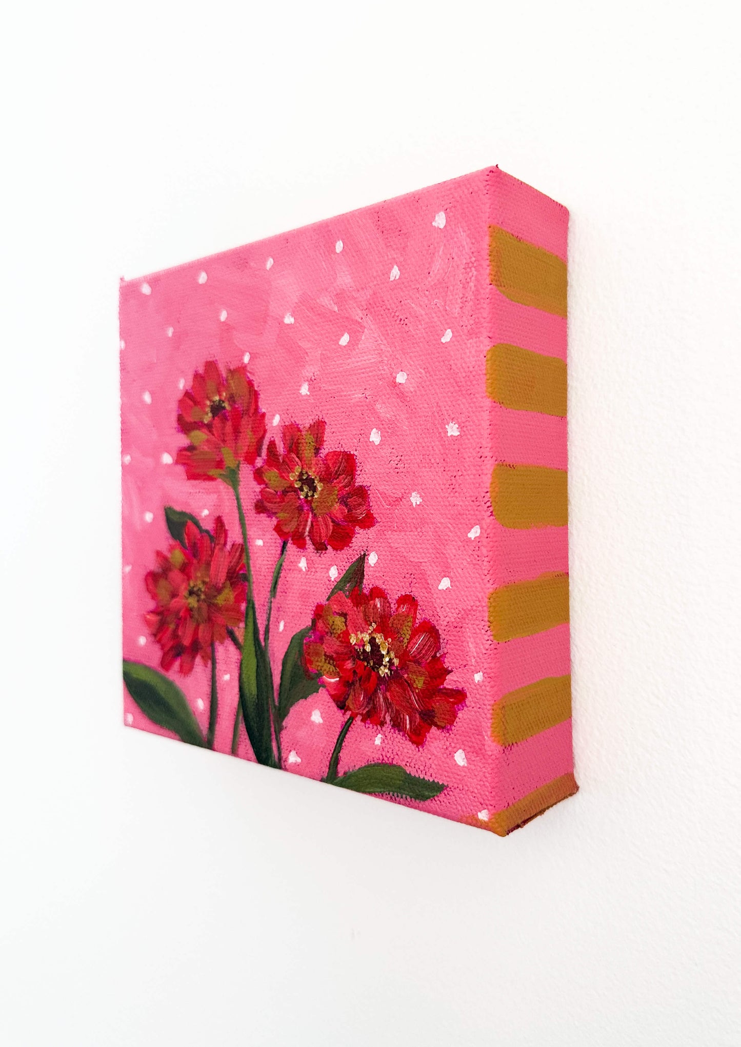 Canvas with floral design on a pink background