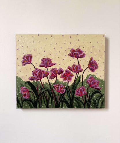 Painting of pink flowers with a light yellow with purple polka dot background