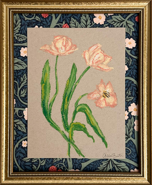 peach florals painted with oil pastels on tan paper, mounted on floral fabric and framed in a gold frame.