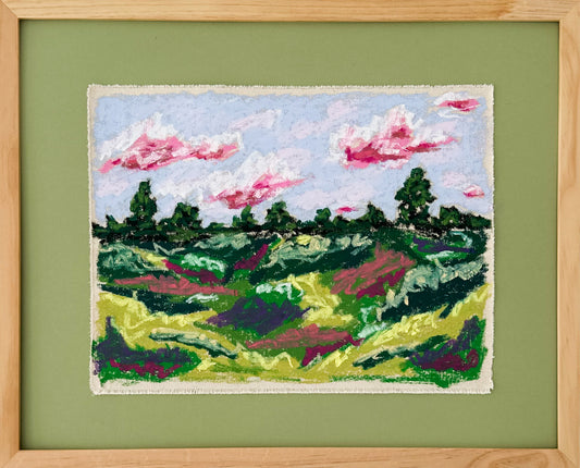 Framed textile art of a landscape with green fields and pink clouds on a green background